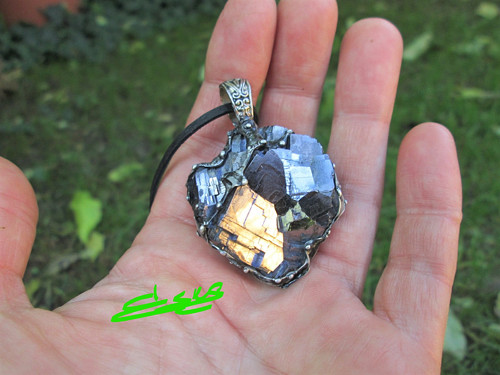 Talisman ,, Tenet " — foto 1