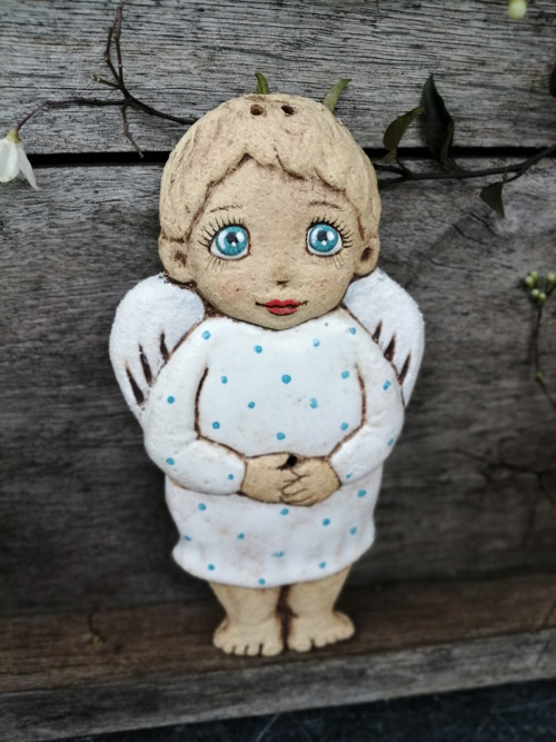 Andílek buclatý , reliéf — foto 1