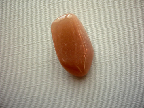 Troml. - měsíční kámen oranžový 23 mm, č.36