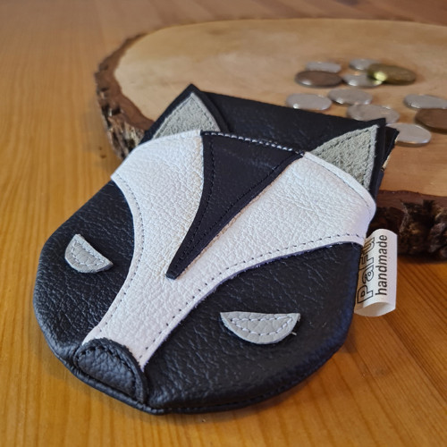 Kožená mincovka skunk — foto 1