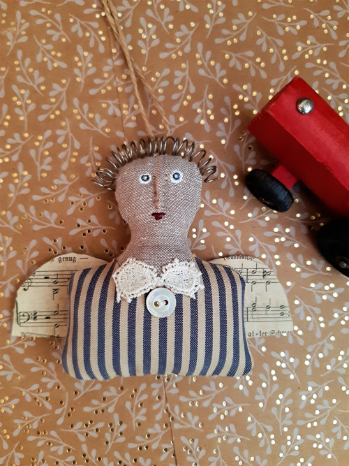 Anděl s motýlkem — foto 1