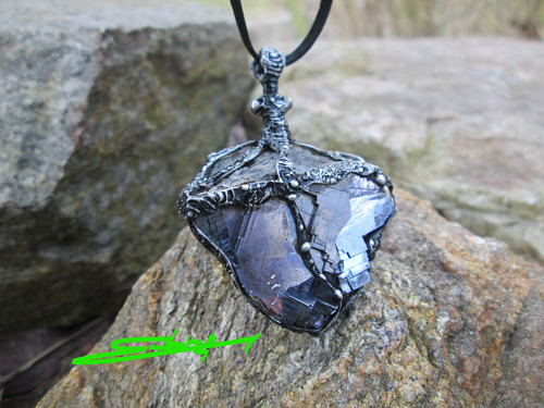 Talisman ,, Tenet " — foto 1