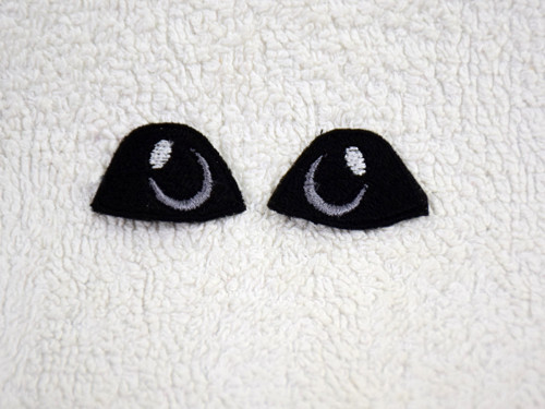 Vyšívané oči černé s jiskrou 4x2,5cm 1 pár