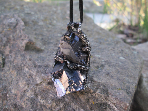 Talisman ,, Tenet " — foto 1