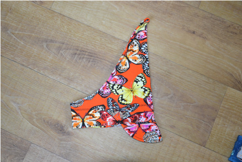 Šátek s kšiltem "motýly na oranžové " vel. 45-47cm