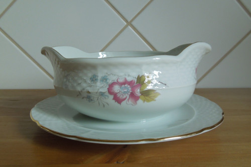 Starý porcelánový omáčkovník