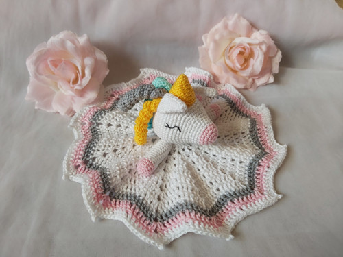 Háčkovaný jednorožec muchláček
