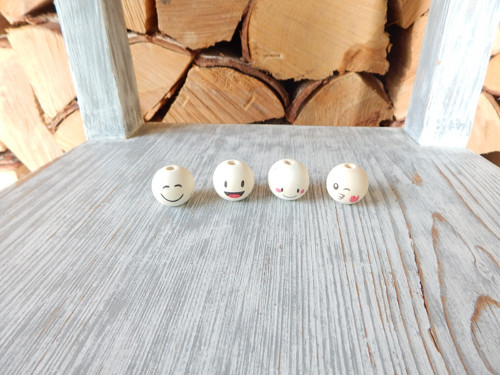 Hlavičky dřevěné 4 kusy 2,4 cm