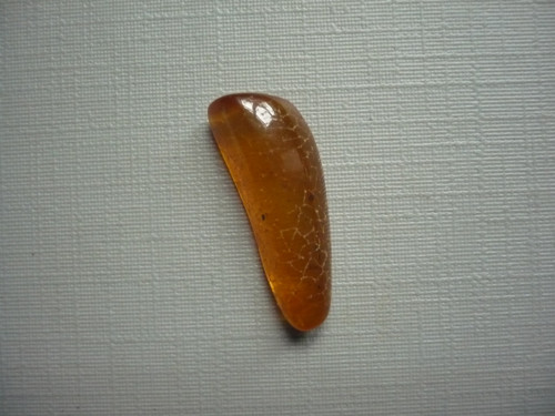 Troml. kámen – jantar 22 mm, č.110f