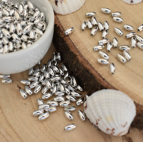 .Plast. korálky rýže 6x3mm - stříbrné