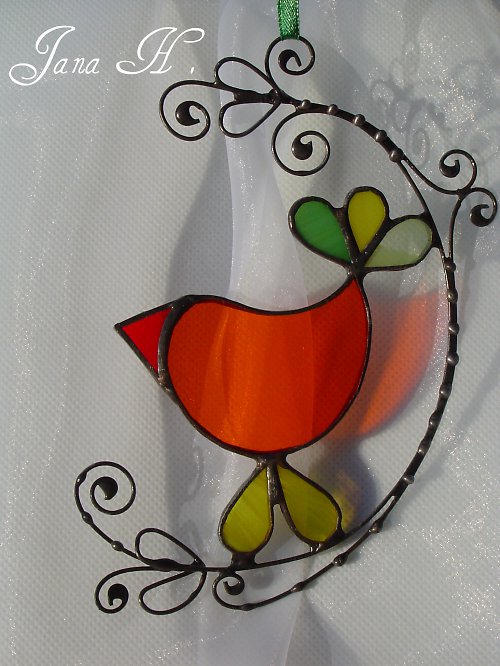 Oranžový ptáček — foto 1