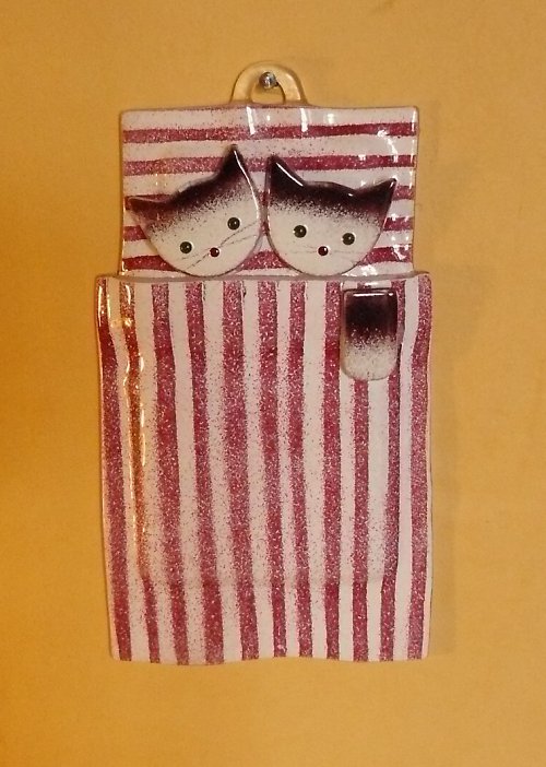 Kočka Postel — foto 1