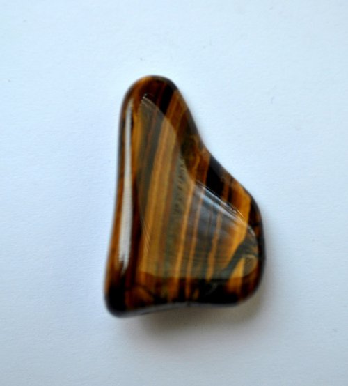 Tromlovaný kámen - tygří oko — foto 1