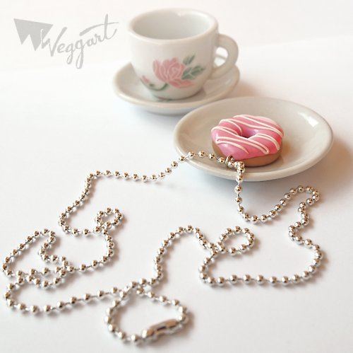 Růžový donut na krk — foto 1