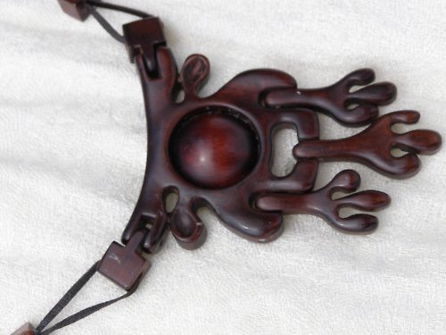 Dřevěný talisman — foto 1