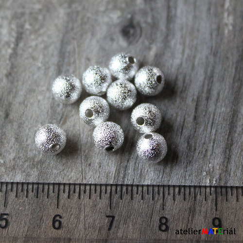 Kovové korálky 0,6mm 10ks — foto 1