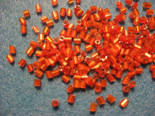 Rokajl oranžový s pruvlakem 2mm 11/0 (cena 10gr)
