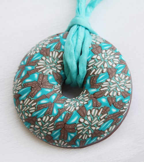 Tyrkysovohnědý drobně vzorovaný donut — foto 1