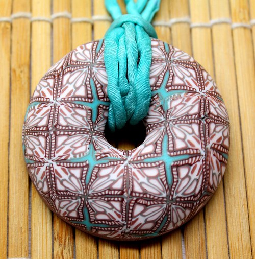 Hnědotyrkysový... donut — foto 1