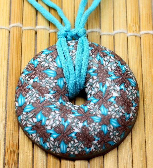 Hnědotyrkysový donut — foto 1