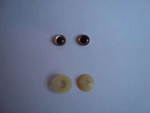Zlatá plastová očka - 8 mm — foto 1