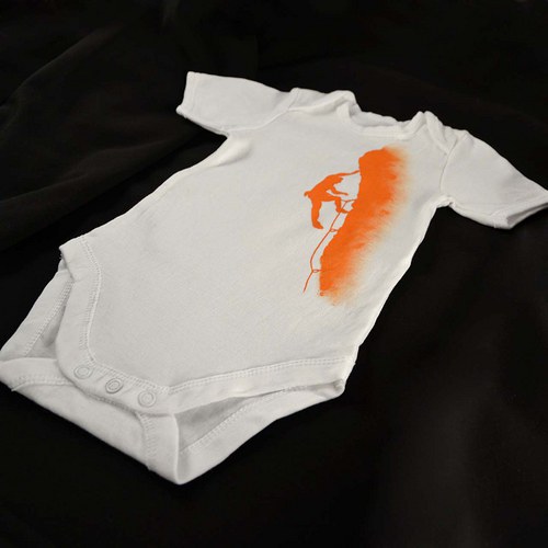 Dětské body s oranžovým horolezcem