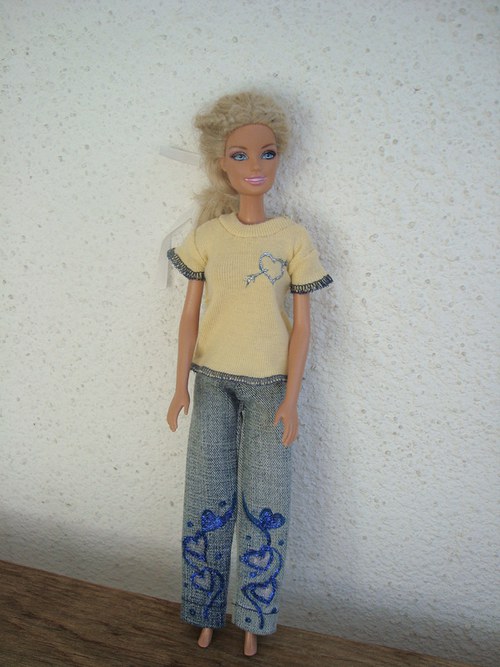 Jeans se srdíčky. — foto 1