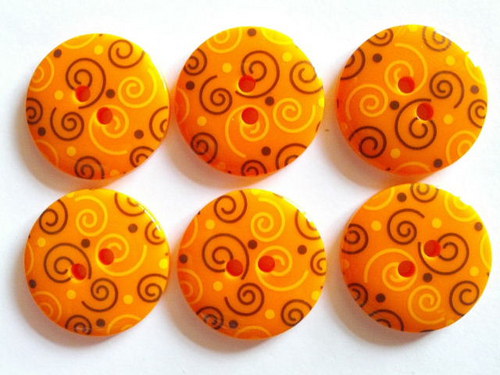 Knoflík 23 mm SPIRÁLA ORANŽOVÁ