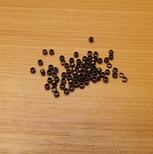 Zamačkávací rokajl - 2mm - bronz - 100 kusů