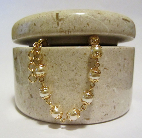 Náramek zlaté perle — foto 1