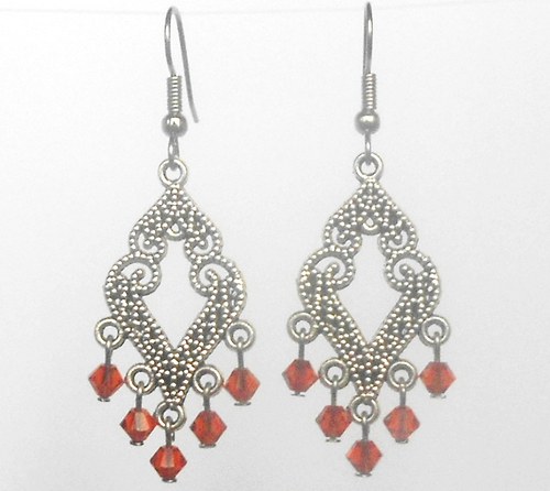 SWAROVSKI naušnice oranžové — foto 1