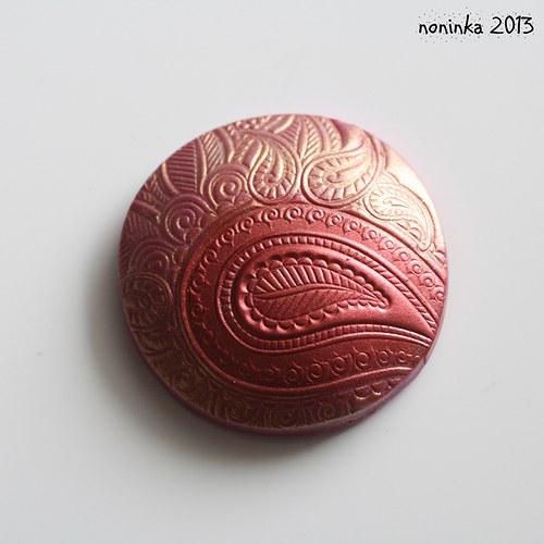 Hnědo-zlatá placka — foto 1
