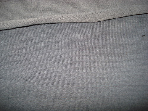 Jednolícní pletenina šedá — foto 1