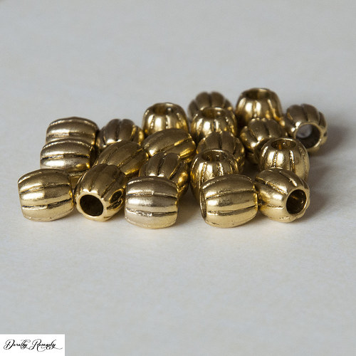 Zlaté oválky tibetského typu - dírka 3.8mm - 20 ks