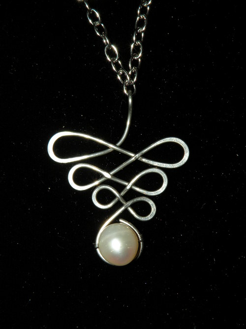 Ornament s perlou — foto 1