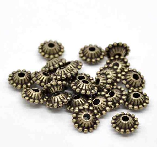 Kovový korálek antický bronz 11x5mm/ 50ks