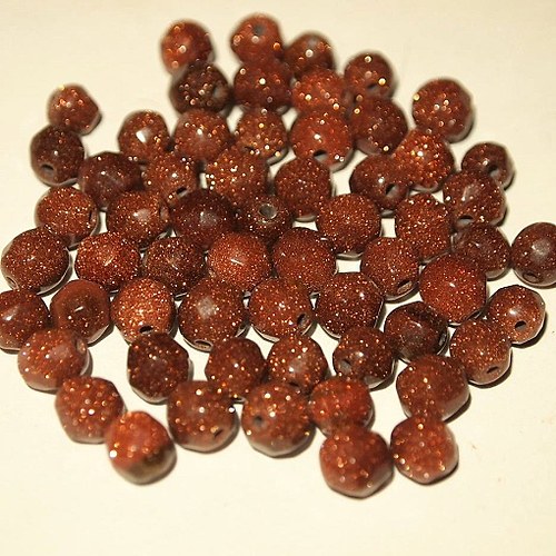 Zlatý Goldstone kuličky fasetované 6 mm (cena 6ks)