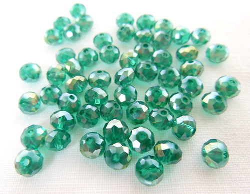 Swarovski - petrolejové rondelky s AB efektem 6 mm