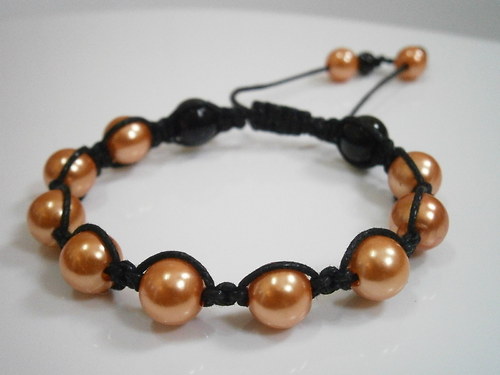 Náramek Shamballa oranžový