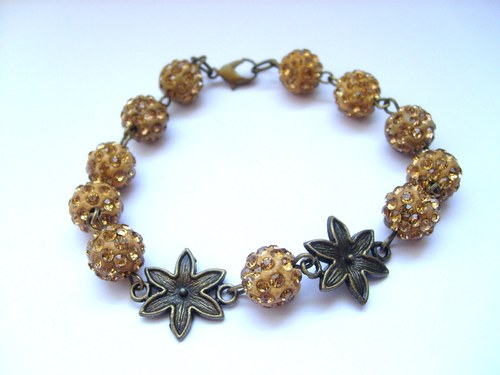 Zlatý s květinou — foto 1