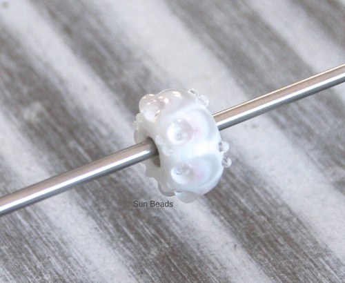 Big hole bead - Peříčka — foto 1