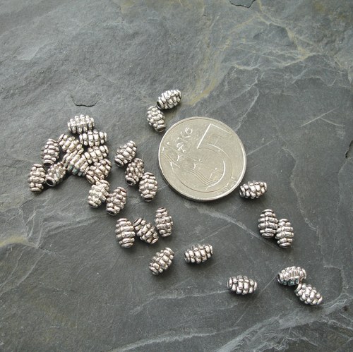 Kovový korálek cca 4x7mm - 50 ks - SST