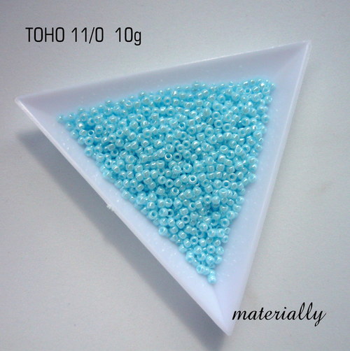 TOHO round 11/0 Opaque-Lustered Pale Blue -10g — foto 1