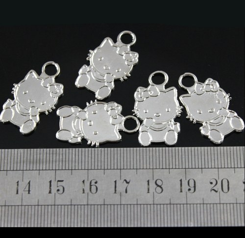 Kovové přívěsky Hello Kitty OBOUSTRANNÉ — foto 1