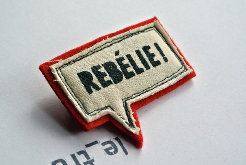 Brož REBÉLIE! — foto 1