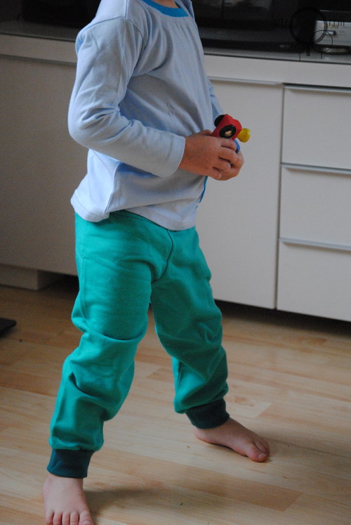 Dětské tepláky zelenkavé, vel. 6-9 M — foto 1