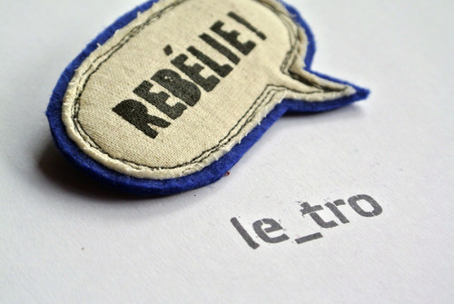 Brož REBÉLIE! — foto 1