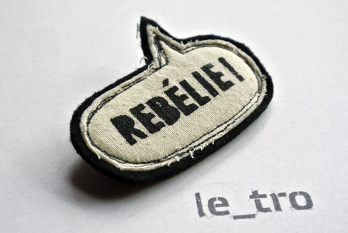 Brož REBÉLIE! — foto 1