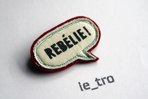 Brož REBÉLIE! — foto 1