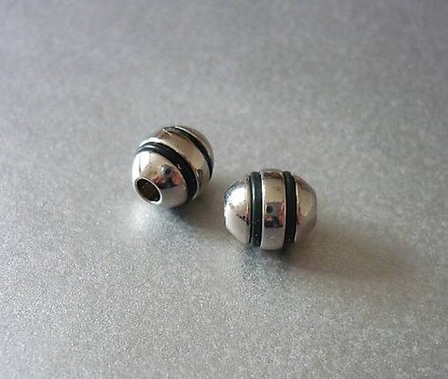 Ch115/ korálek s pryží ovál CHIR.OCEL/8x8,5 mm